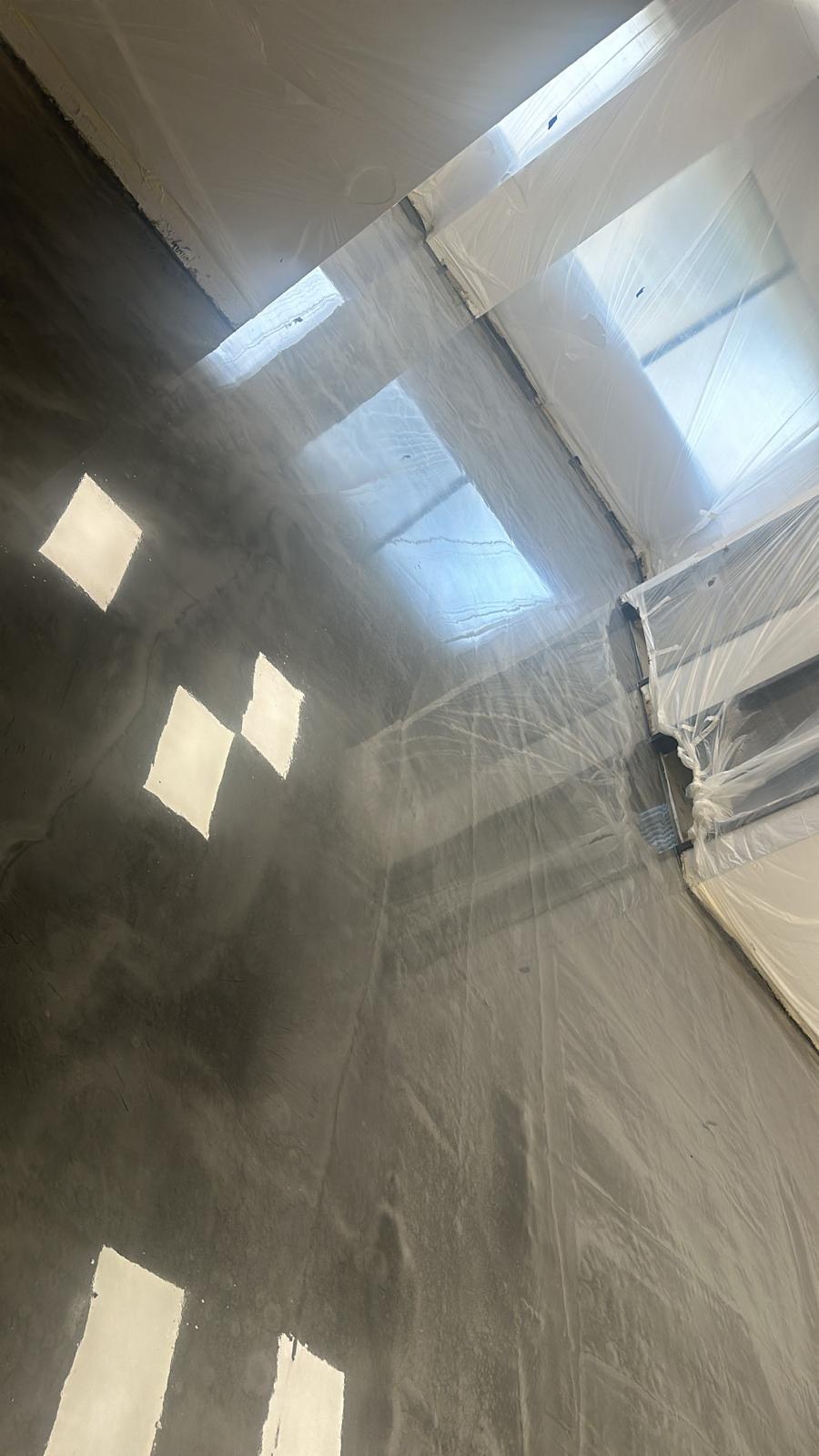 Masked room during epoxy cure in Johns Creek GA — AAA Construction Services